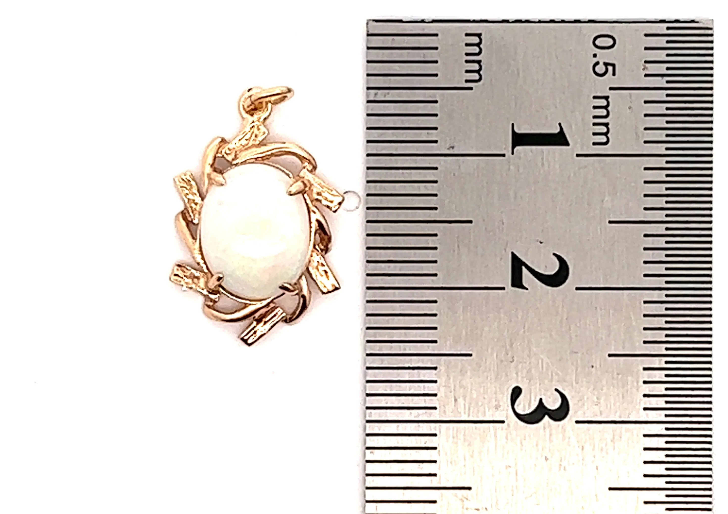 Light Opal 9ct Yellow Gold Pendant